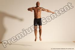 Underwear Gymnastic poses Man Black Muscular Bald Dancing Dynamic poses Academic